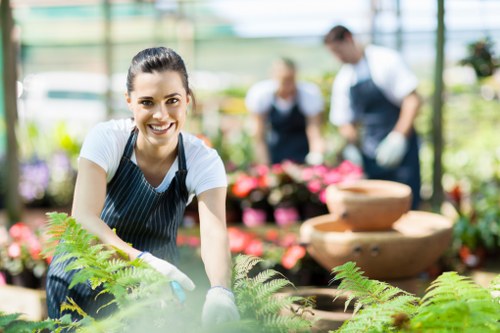 Team member wearing PPE during garden maintenance